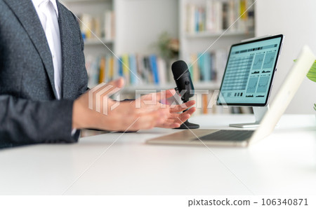 A man having a video conference 106340871