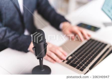 A man having a video conference 106340947