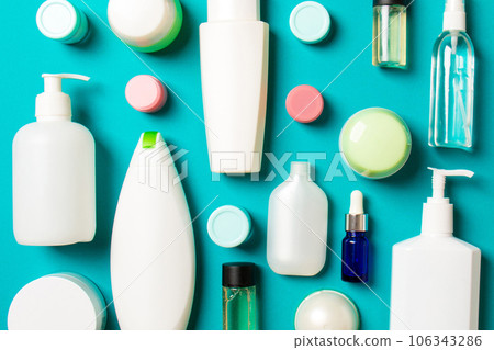 Group of plastic bodycare bottle Flat lay composition with cosmetic products on colored background empty space for you design. Set of White Cosmetic containers, top view with copy space 106343286