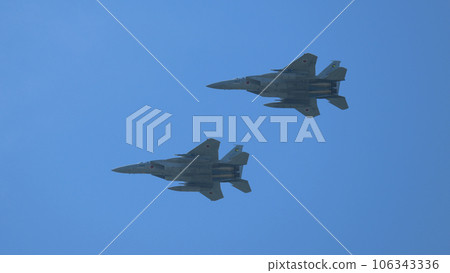 JASDF F-15 Eagle formation flying overhead 106343336