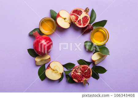 Rosh hashanah concept. Frame made of symbols jewish New Year holiday Traditional. Top view with copy space Rosh hashanah concept. Frame made of symbols jewish New Year holiday Traditional. Top view with copy space 106343408