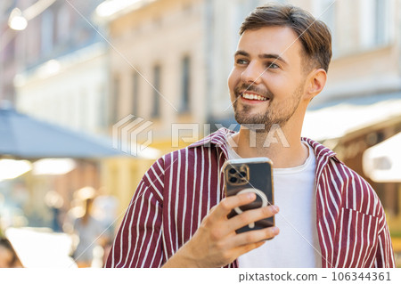 Bearded man use smartphone typing text messages browsing internet finishing work chatting online Bearded man use smartphone typing text messages browsing internet finishing work chatting online 106344361