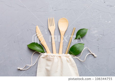 Eco friendly reusable recyclable white eco bag with kitchenware on Colored background. Concept zero waste 106344755