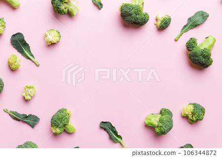 Flat lay composition with fresh green broccoli frame eith copy space on light background 106344872