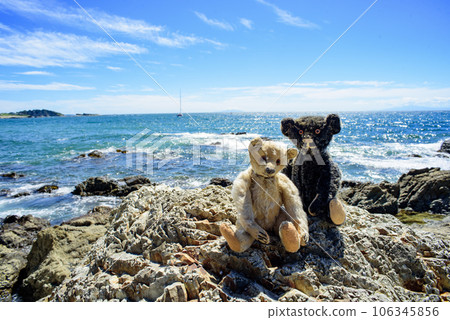 Antique teddy bear on the beach in summer 3 106345856