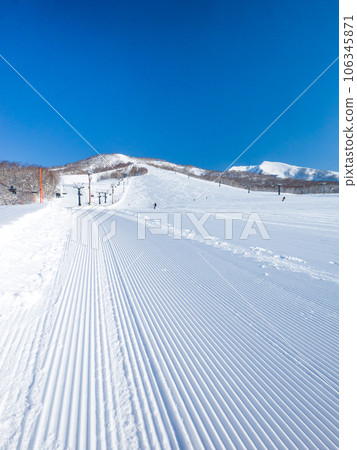 Ski resort with freshly compacted snow in the morning (Hokkaido, Niseko) 106345871