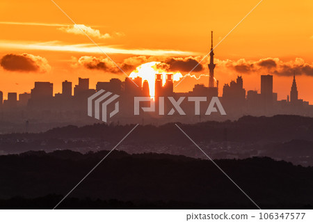 "Tokyo" Dawn of Tokyo, the sun rising from the skyscraper "Tokyo" Dawn of Tokyo, the sun rising from the skyscraper 106347577