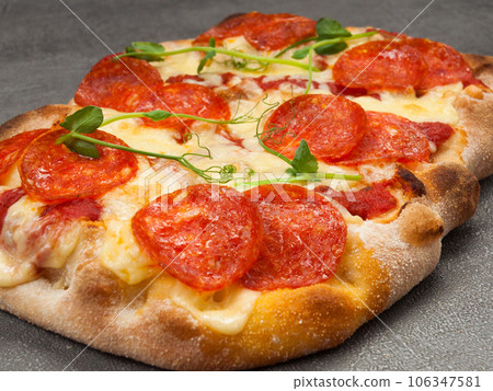 italian pizza with mozzarella and pepperoni 106347581
