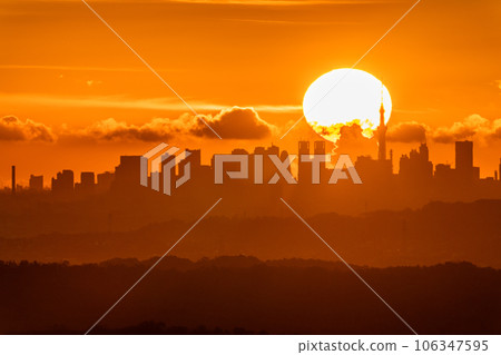 "Tokyo" Dawn of Tokyo, the sun rising from the skyscraper 106347595