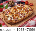 italian pizza with sausages, mushrooms and mozzarella 106347669