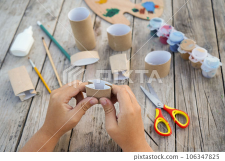 Kids craft bunnies out of recycling toilet paper roll, zero waste concept. Step by step instruction - 3 Kids craft bunnies out of recycling toilet paper roll, zero waste concept. Step by step instruction - 3 106347825