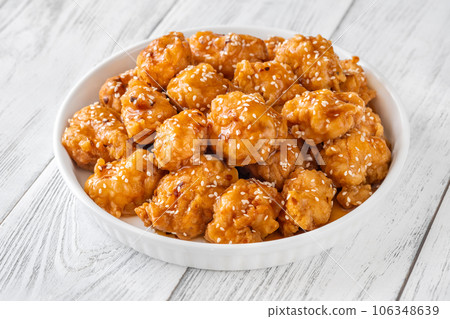 Bowl of orange chicken 106348639