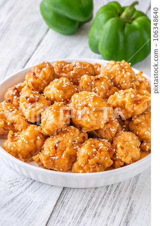 Bowl of orange chicken 106348640
