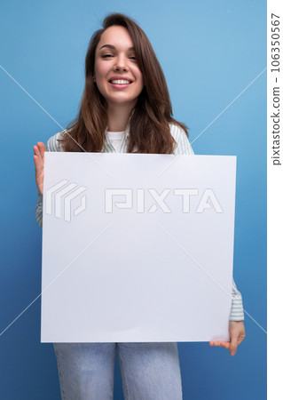 european active 25 year old young brown-haired woman demonstrating business project on white board european active 25 year old young brown-haired woman demonstrating business project on white board 106350567