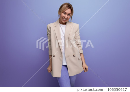 attractive business young woman in office jacket on studio background attractive business young woman in office jacket on studio background 106350617