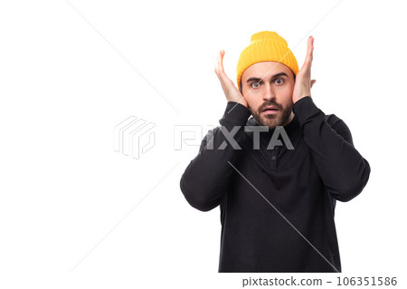 handsome 30s authentic brunet male adult in black sweatshirt posing as model on white background handsome 30s authentic brunet male adult in black sweatshirt posing as model on white background 106351586