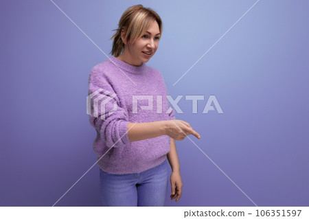 charming blond young millennial woman in casual look scolding someone on bright background with copy charming blond young millennial woman in casual look scolding someone on bright background with copy 106351597