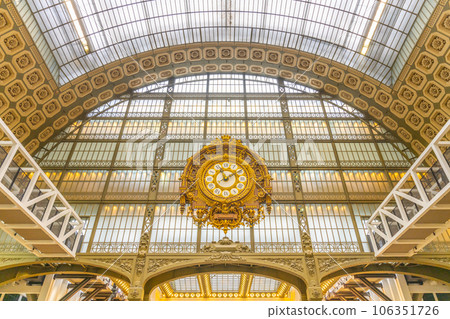 Ornamental golden clock in Orsay Museum, French: Musee d Orsay, in former train station building, Paris, France. 106351726