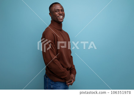 close-up of a handsome young smiling african guy with kind eyes 106351978