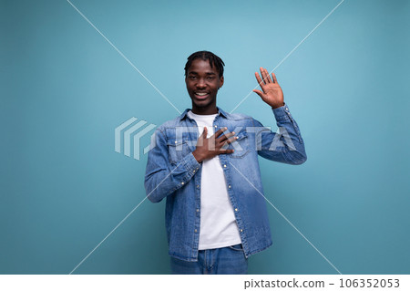 portrait of a black american young man with dreadlocks shows that everything will be ok portrait of a black american young man with dreadlocks shows that everything will be ok 106352053