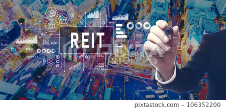REIT - Real Estate Investment Trust theme with businessman in city at night 106352200