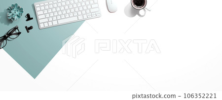 Computer keyboard with a cup of coffee and eyeglasses Computer keyboard with a cup of coffee and eyeglasses 106352221