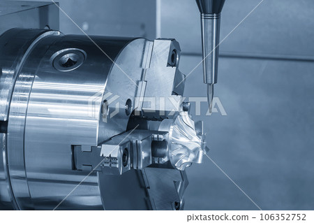The 5-axis CNC milling machine cutting the turbocharger part with solid ball end mill tool. The 5-axis CNC milling machine cutting the turbocharger part with solid ball end mill tool. 106352752