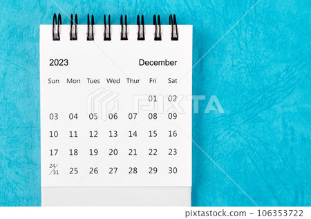 The December 2023 Monthly desk calendar for 2023 year on blue background. 106353722