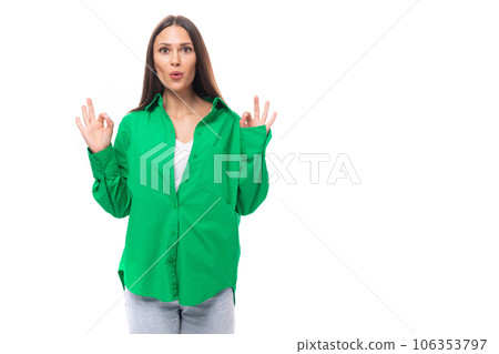 pretty slim european brunette woman with long hair and brown eyes dressed in casual green shirt is 106353797