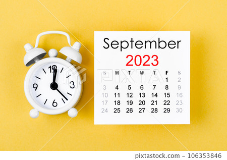 The September 2023 Monthly calendar for 2023 year with alarm clock on yellow background. The September 2023 Monthly calendar for 2023 year with alarm clock on yellow background. 106353846