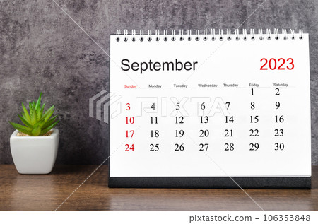 The September 2023 Monthly desk calendar for 2023 year on wooden table. The September 2023 Monthly desk calendar for 2023 year on wooden table. 106353848
