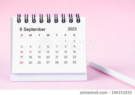 The September 2023 and pencil desk calendar on pink color background. The September 2023 and pencil desk calendar on pink color background. 106353850