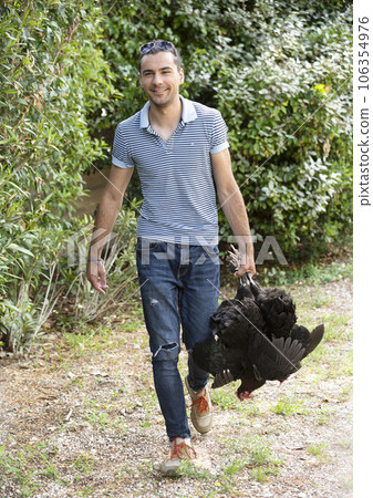 man and chicken man and chicken 106354976