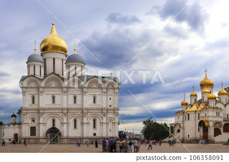Archangel Cathedral of Kremlin in Moscow against backdrop of picturesque clouds on summer day Archangel Cathedral of Kremlin in Moscow against backdrop of picturesque clouds on summer day 106358091