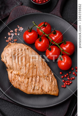 Delicious juicy grilled chicken fillet with salt, spices and herbs Delicious juicy grilled chicken fillet with salt, spices and herbs 106359882