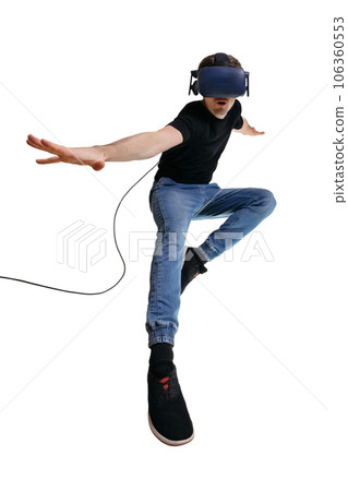 Casual young man in VR simulator finding himself a superhero.  106360553