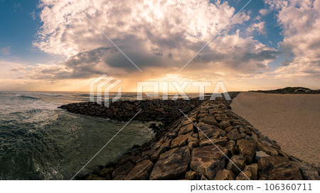 View of the seawall south of Furadouro beach View of the seawall south of Furadouro beach 106360711
