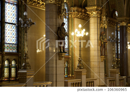 BUDAPEST, HUNGARY - MARCH 03, 2019: Gallery with lots of gold, marble and sandstone inside the Budapest Parliament building, the seat of the government of Hungary 106360965