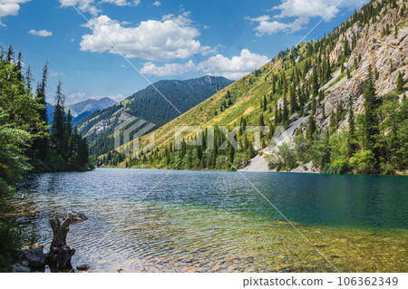Amazing scenic view on Kolsay lake in Kolsai Koldery gorge near Almaty, nature of Kazakhstan National Park, Central Asia Amazing scenic view on Kolsay lake in Kolsai Koldery gorge near Almaty, nature of Kazakhstan National Park, Central Asia 106362349