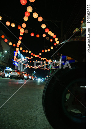 Traffic with tuk tuk wheel in the night of Bangkok. Traffic with tuk tuk wheel in the night of Bangkok. 106362621