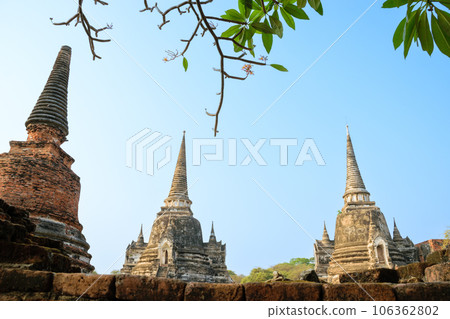 Beautiful view of the pagodas and stupas of Ayutthaya ruins, at Wat Ratchaburana and Wat Phra Si Sanphet temple. Beautiful view of the pagodas and stupas of Ayutthaya ruins, at Wat Ratchaburana and Wat Phra Si Sanphet temple. 106362802