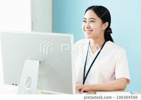 Medical staff woman working on a computer Medical staff woman working on a computer 106364566