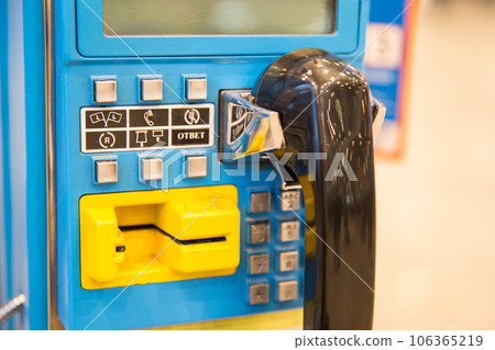 Close up of a blue modern Payphone 106365219