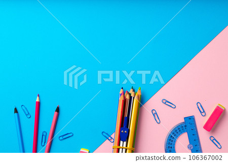 Back to school. Scattered stationery on paper background 106367002