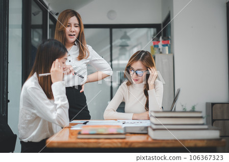 Serious business team leader coach mentor talk to diverse business people in office explain strategy at corporate group meeting 106367323