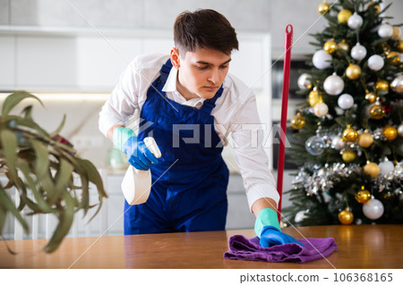 man with surface of table after New Year's eve party 106368165