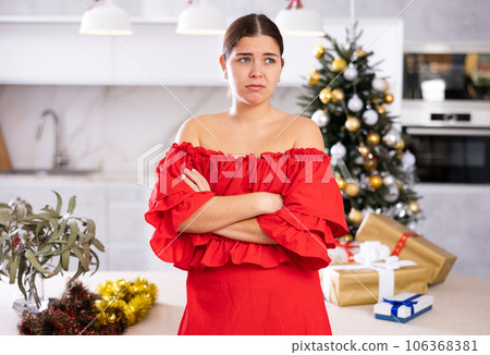 upset girl in a festive New Year s atmosphere 106368381