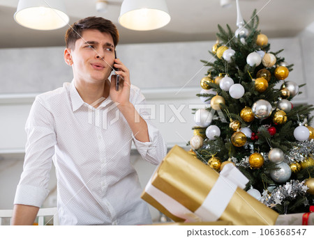 man communicates with friend on phone man communicates with friend on phone 106368547
