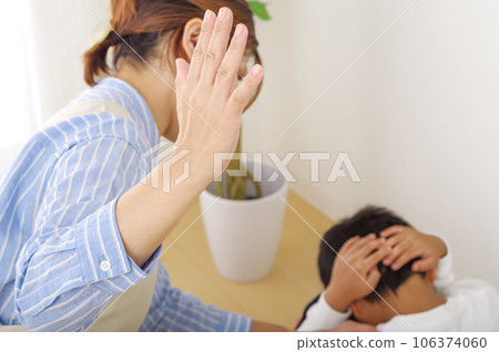 Mother disciplining her child (corporal punishment) 106374060