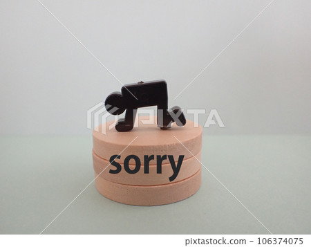 Kneeling figure and sorry letter Kneeling figure and sorry letter 106374075